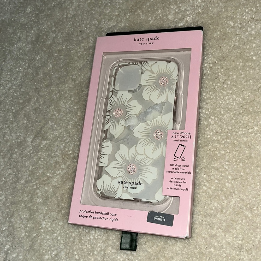 Kate spade phone case for the IPhone 13. Never opened or used.
